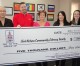 Fort Nelson Petroleum Association presents $5,000 cheque to Fort Nelson Community Literacy Society.